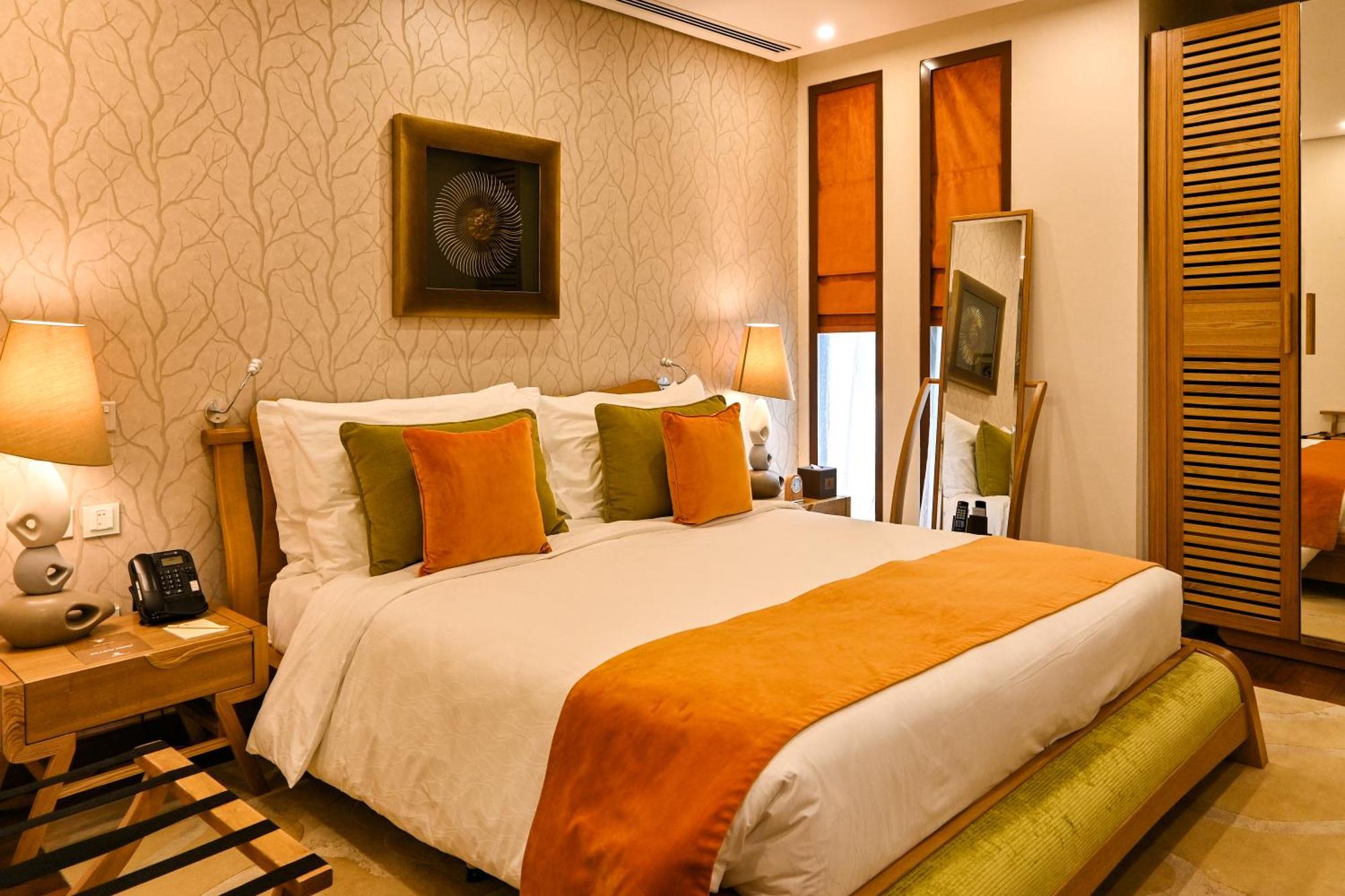 Palavra Resort Manáma Kültér fotó A bedroom at the Taj Bengal