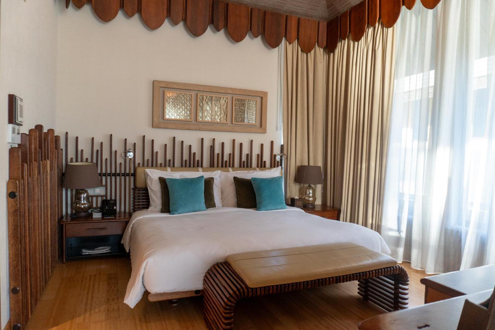 Palavra Resort Manáma Kültér fotó A bedroom at the hotel